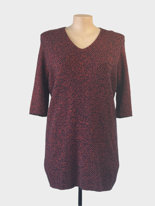 COS sweater dress in brick red and black chevron knit with V-neck and three-quarter sleeves for office or smart casual.