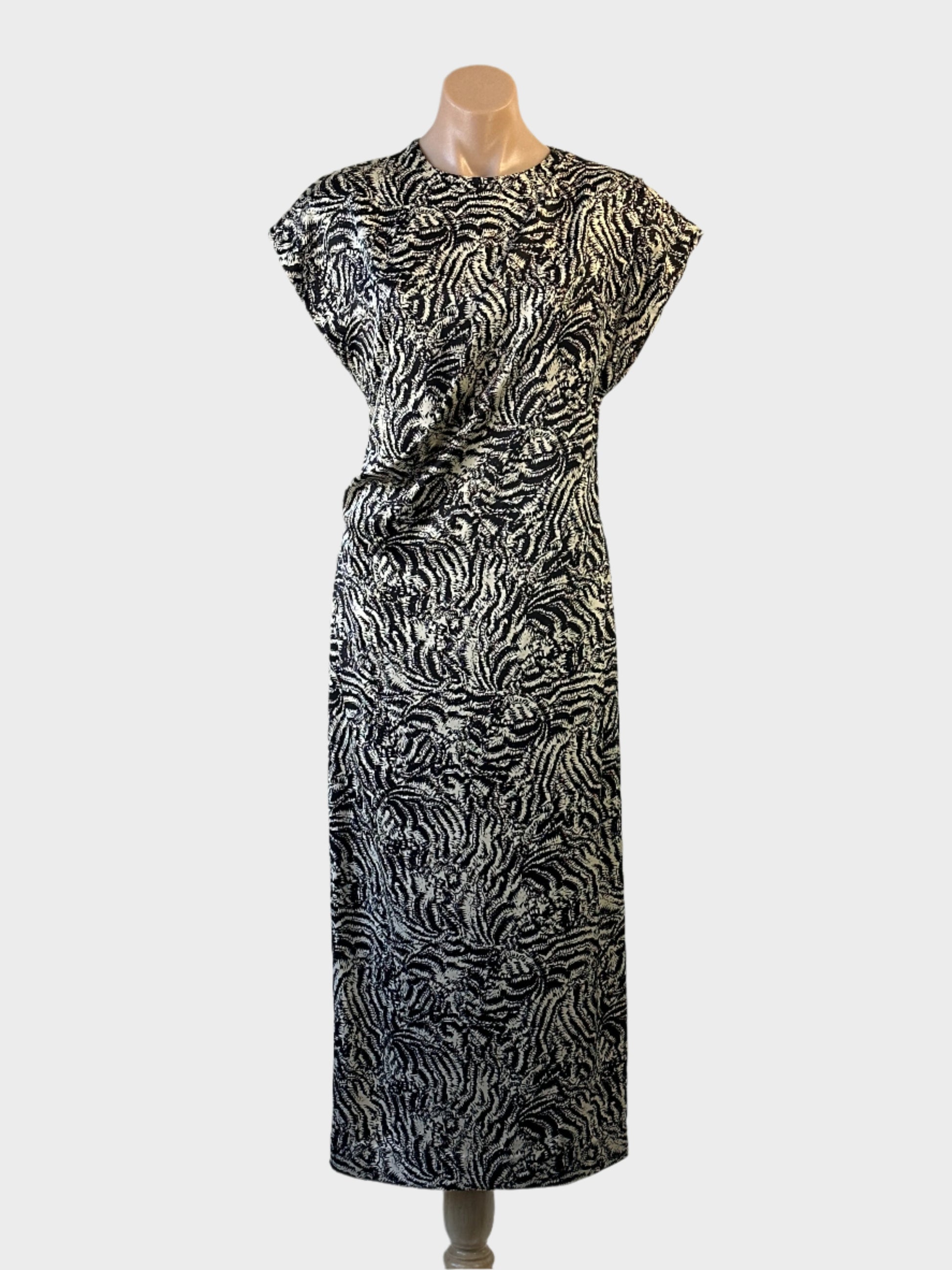 COS dress in cream and black abstract animal print with cap sleeves and gathered waist for evening or special events wear.