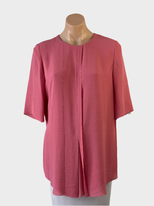 COS pink tunic top with pleated front panel, round neck, elbow length sleeves and curved hem for office or smart casual wear.