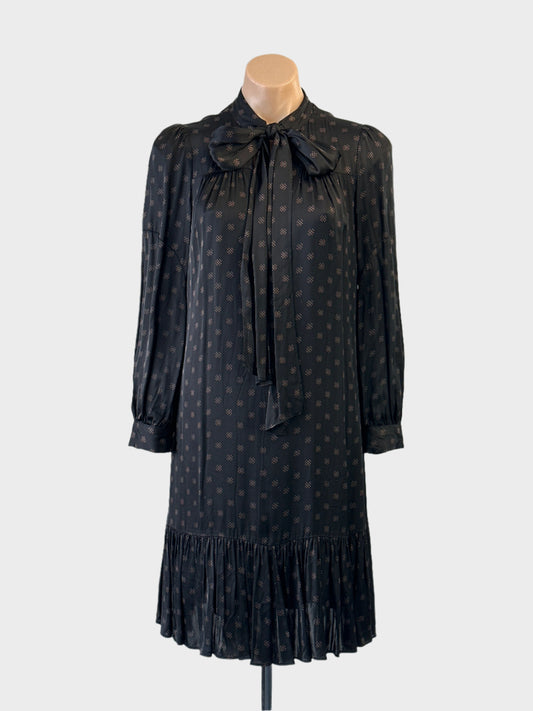 Country Road shift dress in a soft satin finish with dot print, long sleeves, neck tie and ruffle hem for office or smart casual wear.