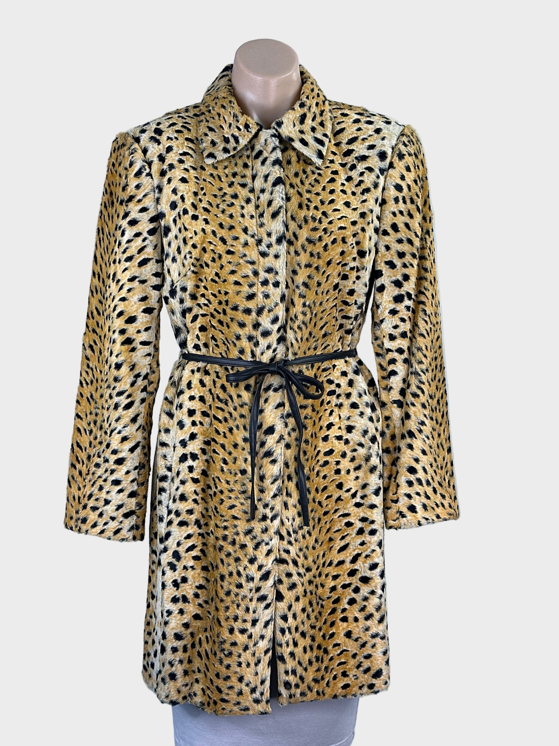 Covers vintage 90’s golden tan faux fur coat with leopard print, leather waist tie and zip front for evening or special events