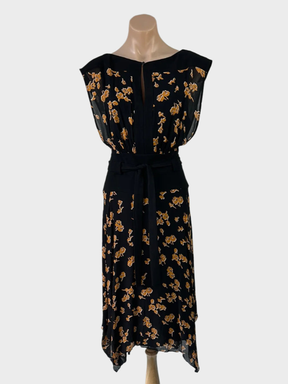 Cue black and brown A-line dress in sheer crepe with dark floral print, keyhole neck, and handkerchief skirt for office or smart casual wear.