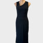 Cue midi length sleeveless black dress with asymmetrical zip neck, panel shaping and back vent for office or formal wear.