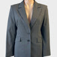 Cue tailored jacket in grey pinstripe with notched lapels and flap pockets for office wear.