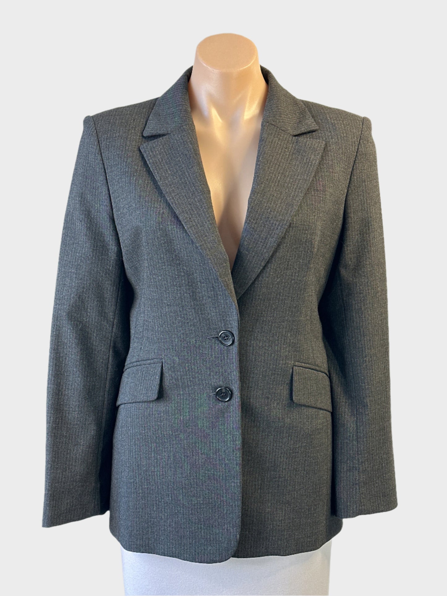 Cue tailored jacket in grey pinstripe with notched lapels and flap pockets for office wear.