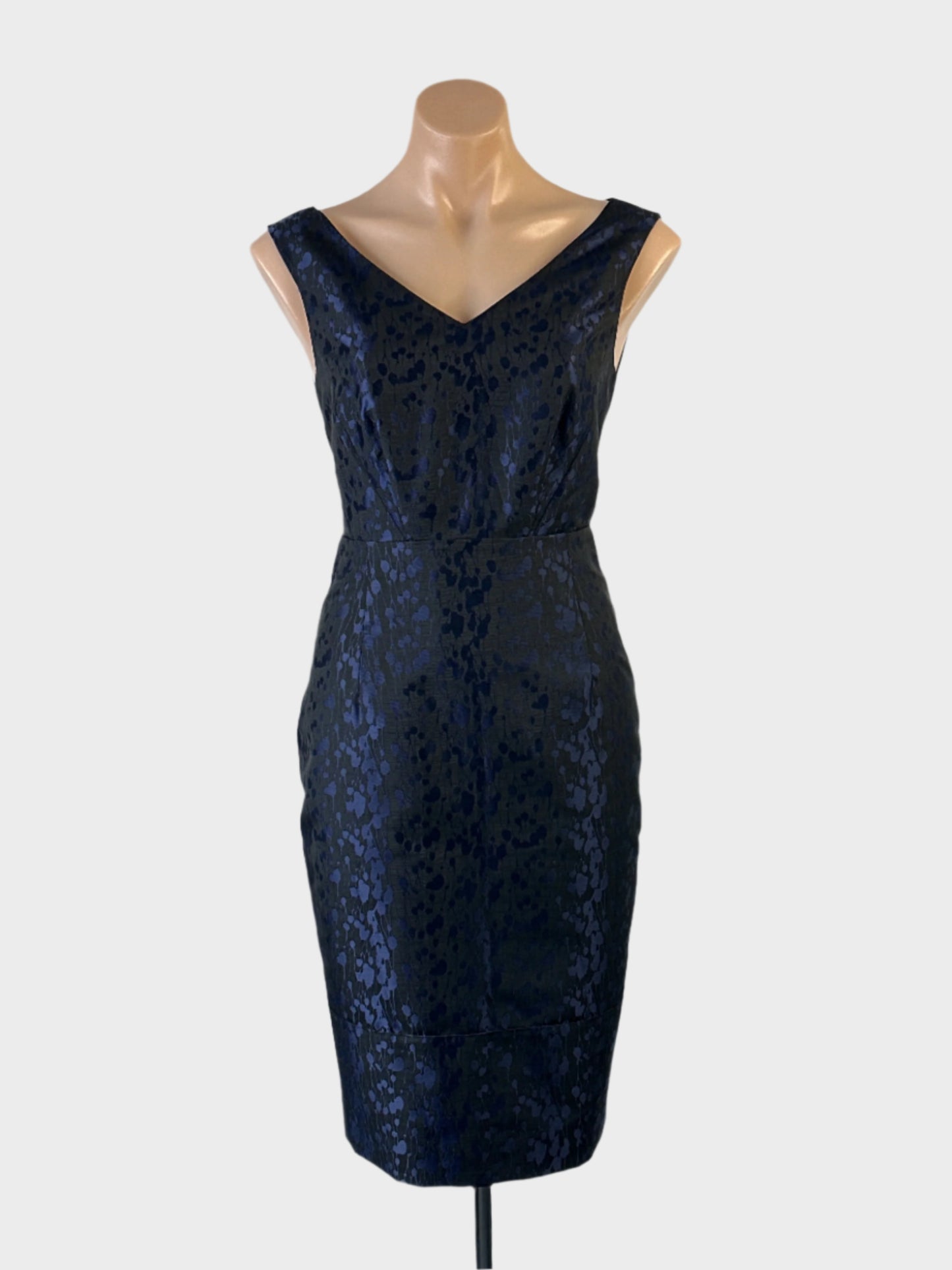 David Lawrence black and blue sleeveless shift dress with splatter print, metallic finish, v-neck and pencil skirt for office or evening wear.