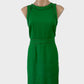 David Lawrence green sheath dress with satin piping, bateau neck, and straight skirt for office wear.