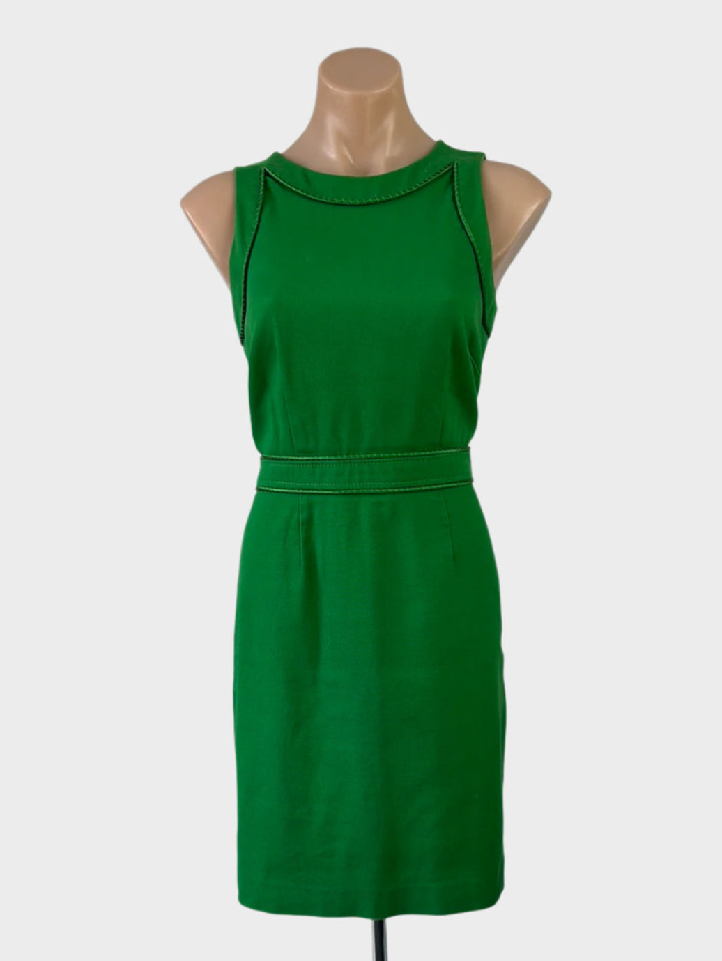 David Lawrence green sheath dress with satin piping, bateau neck, and straight skirt for office wear.