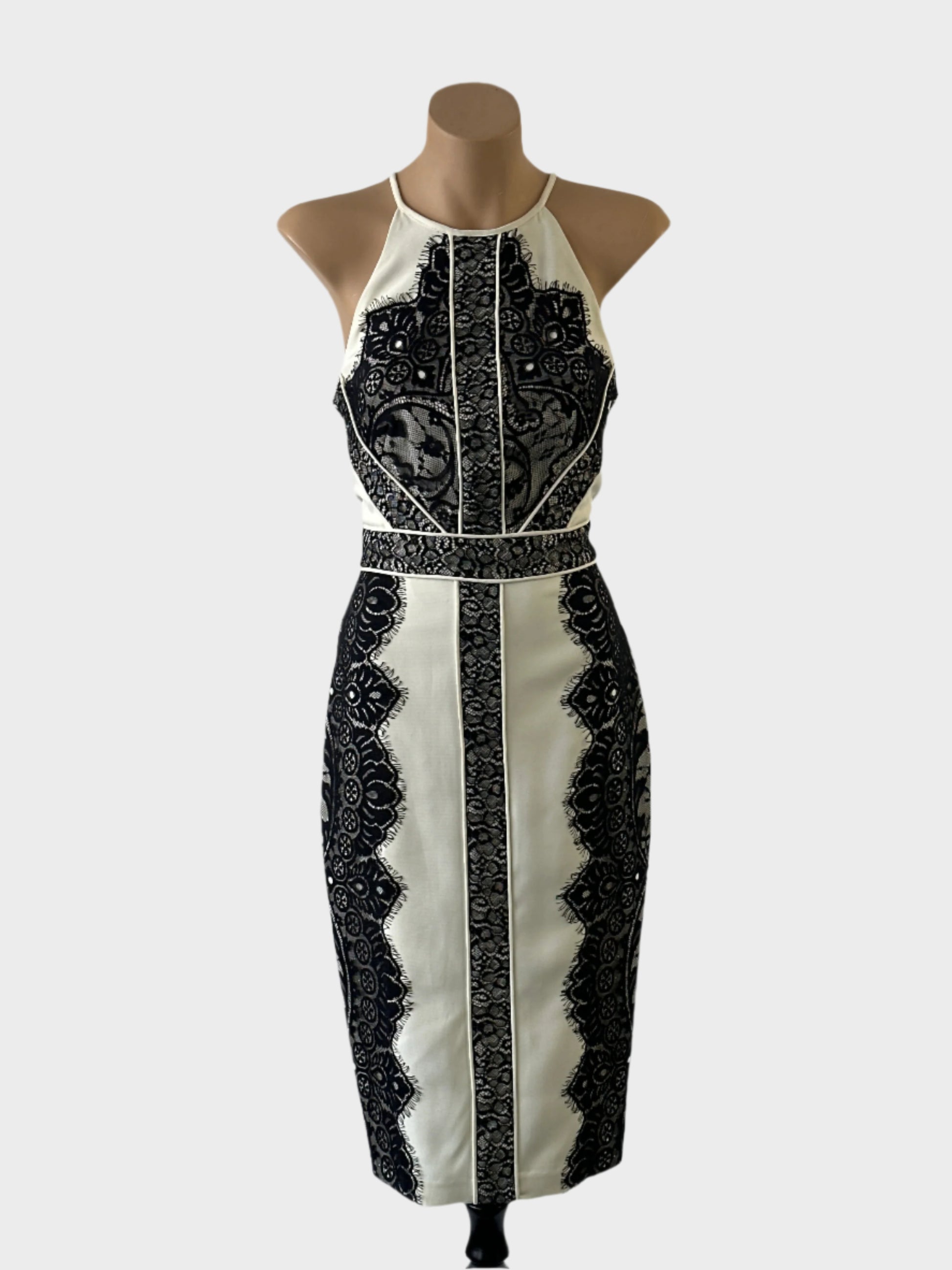 DÉBUT sleeveless sheath dress in cream and black with lace panels, racer back and pencil skirt for evening or special events.