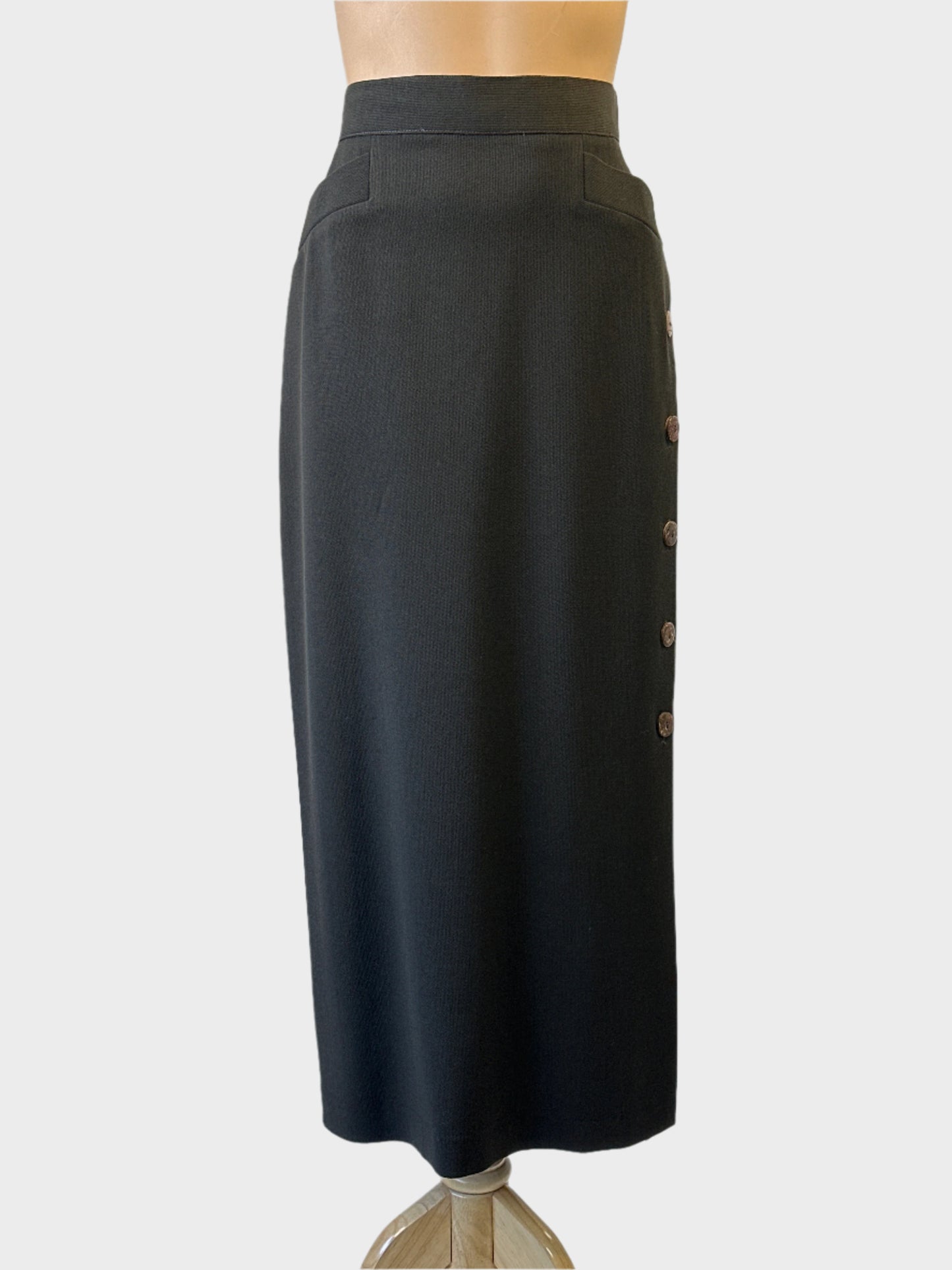 Designer Adam Bennett green textured wool weave straight skirt with coconut shell buttons for office wear.