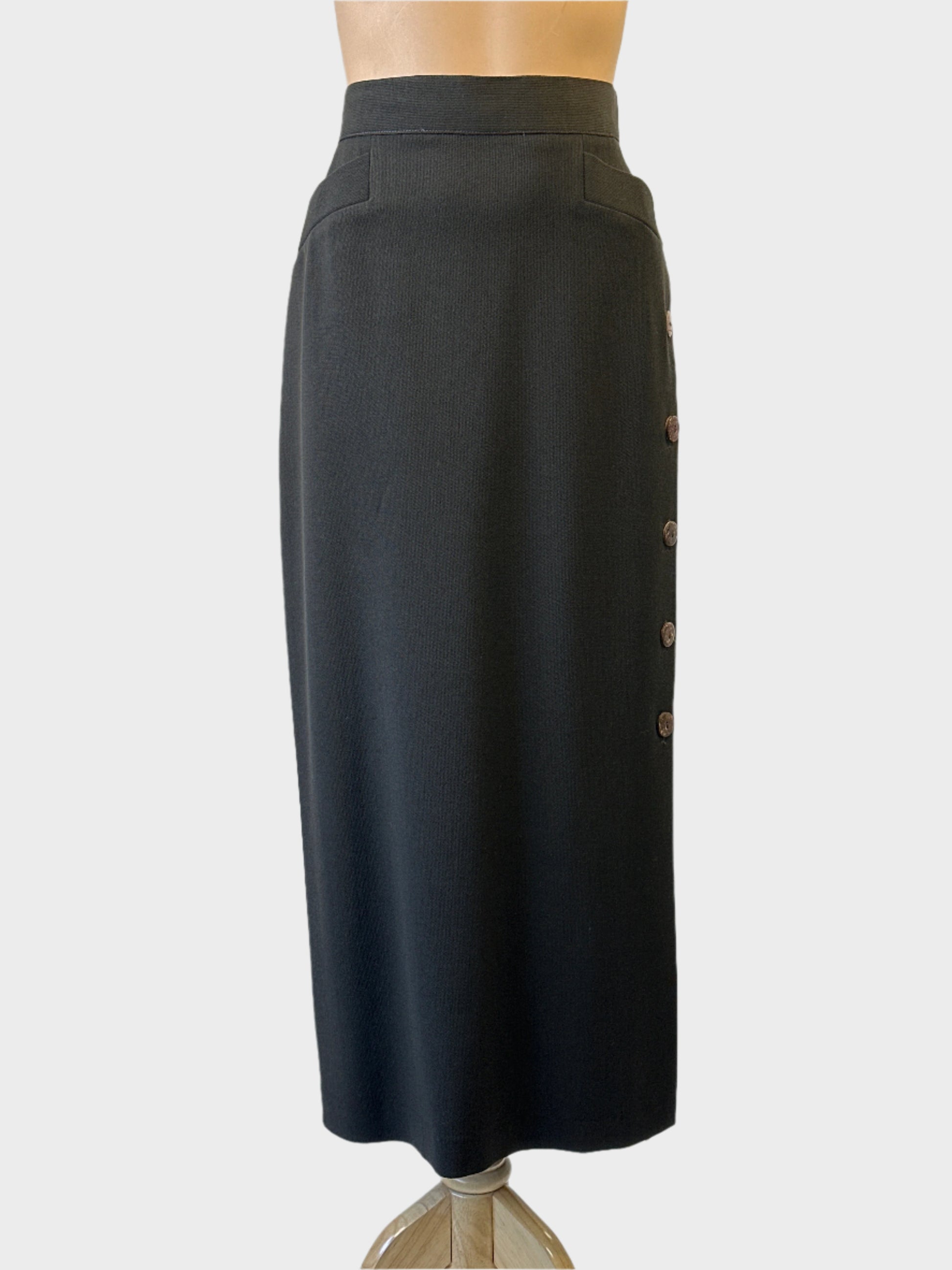 Designer Adam Bennett green textured wool weave straight skirt with coconut shell buttons for office wear.