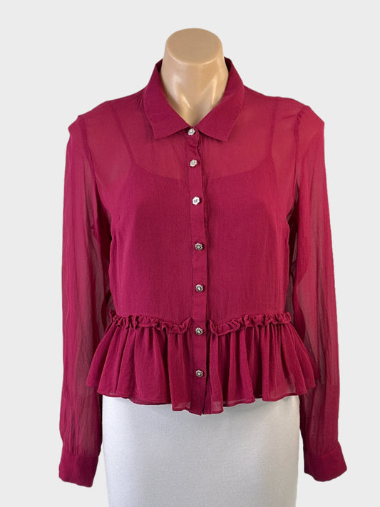 Designer Alannah Hill shirt in raspberry sheer silk crepe with daisy motif buttons, standard collar and gathered peplum for office or special events.