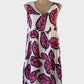 Designer Bellambra pink and white smock dress in linen with botanical print, v-neck, and tiered skirt for smart casual or resort wear.