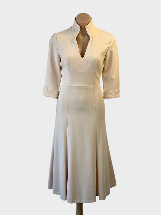 Designer Black Halo beige classic A-line dress with stand up collar and flared skirt for special events wear.