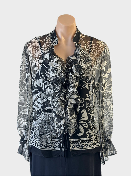 Designer Carla Zampatti top in black and white floral sheer silk crepe with ruffle trim for evening or special events.