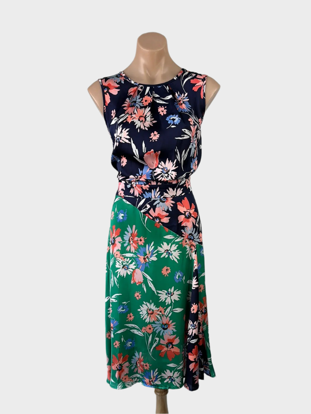 Designer Clements Ribeiro blue and green A-line dress with floral prints, satin finish, and godet skirt for smart casual or office wear.