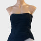 Designer Frank Usher black bustier in ruched crepe with curved hem for formal or evening wear.