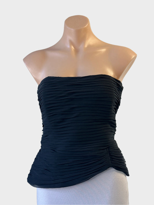 Designer Frank Usher black bustier in ruched crepe with curved hem for formal or evening wear.