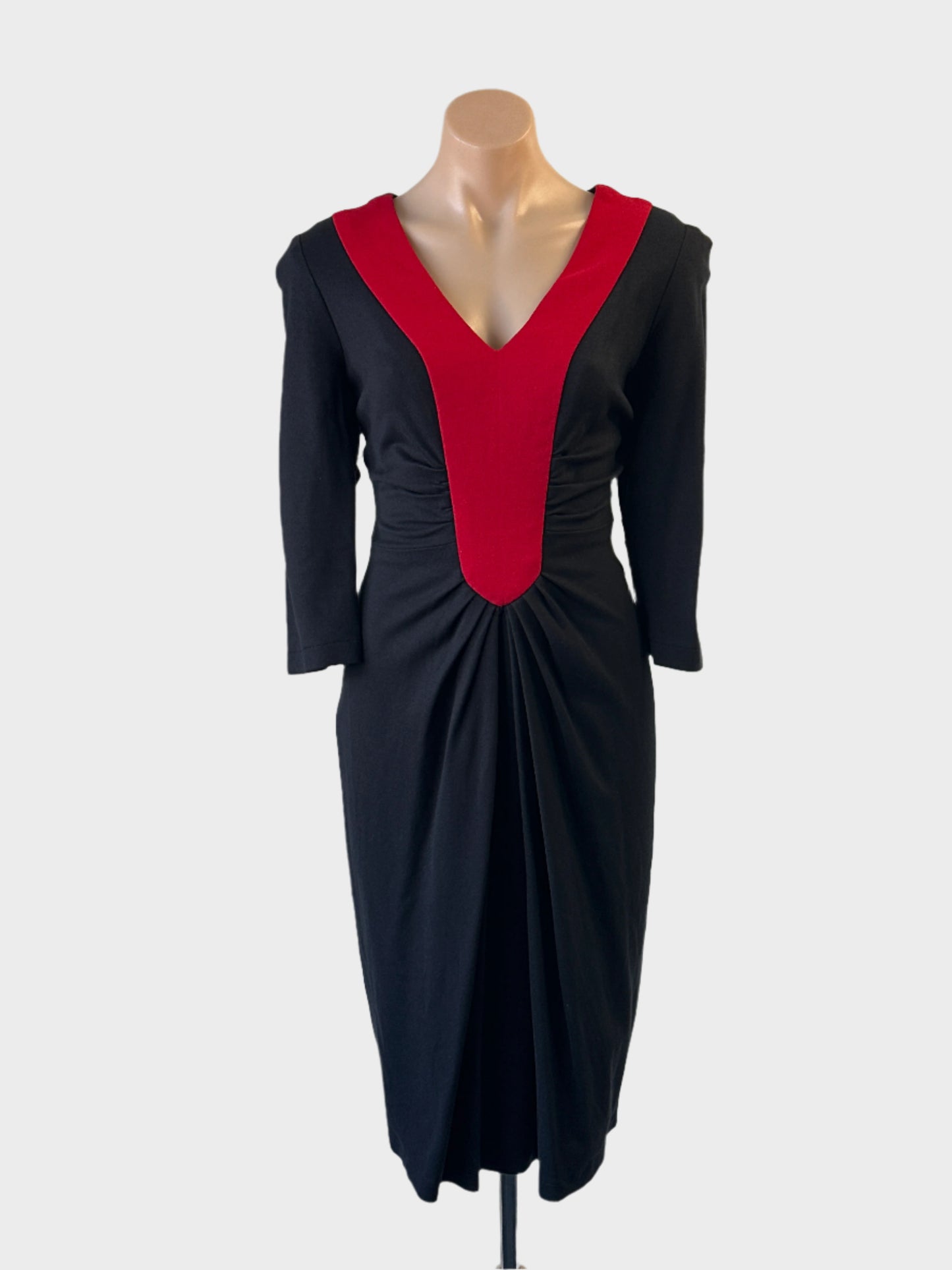 Designer Frankly Ginger black and red sheath dress with v-neck and pleated pencil skirt for evening wear.