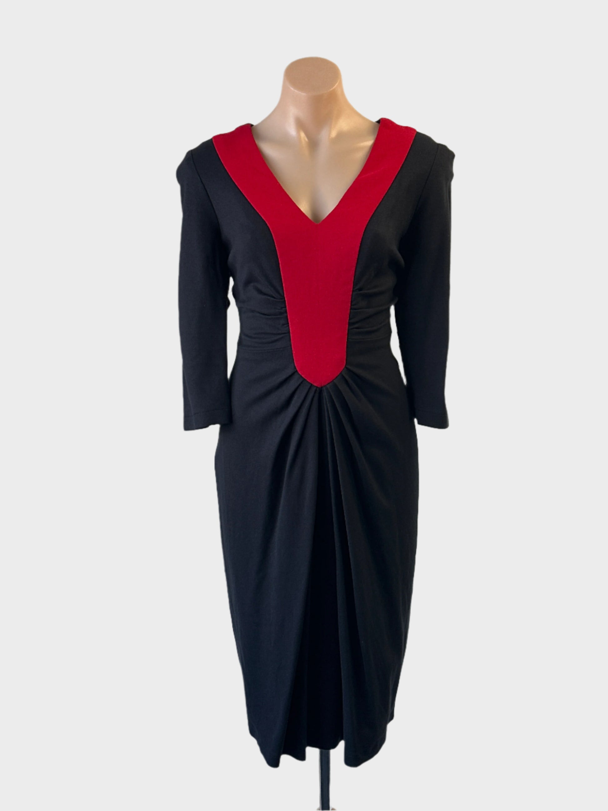 Designer Frankly Ginger black and red sheath dress with v-neck and pleated pencil skirt for evening wear.