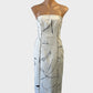 Designer Keepsake white and black line print strapless sheath dress with metal ring seams for special events or evening wear.