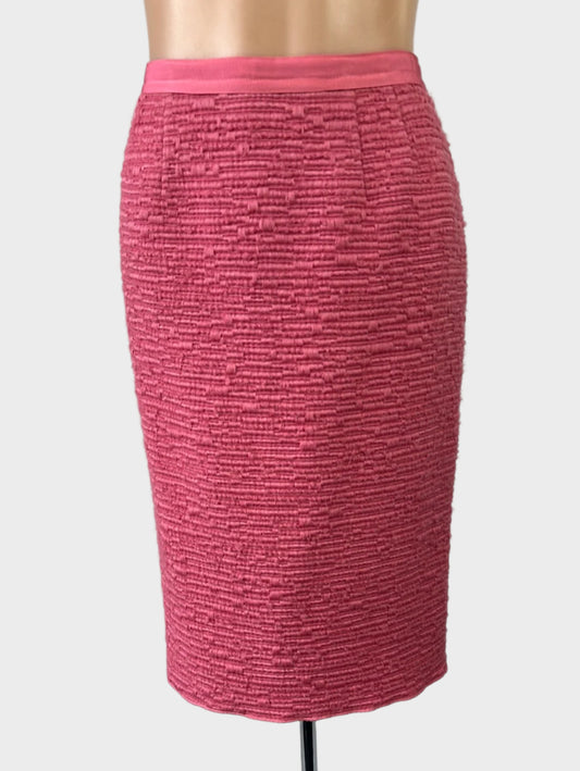 Designer Nina Ricci pink vintage 90's straight skirt in textured weave with grosgrain waistband and back vent for office or special events wear.