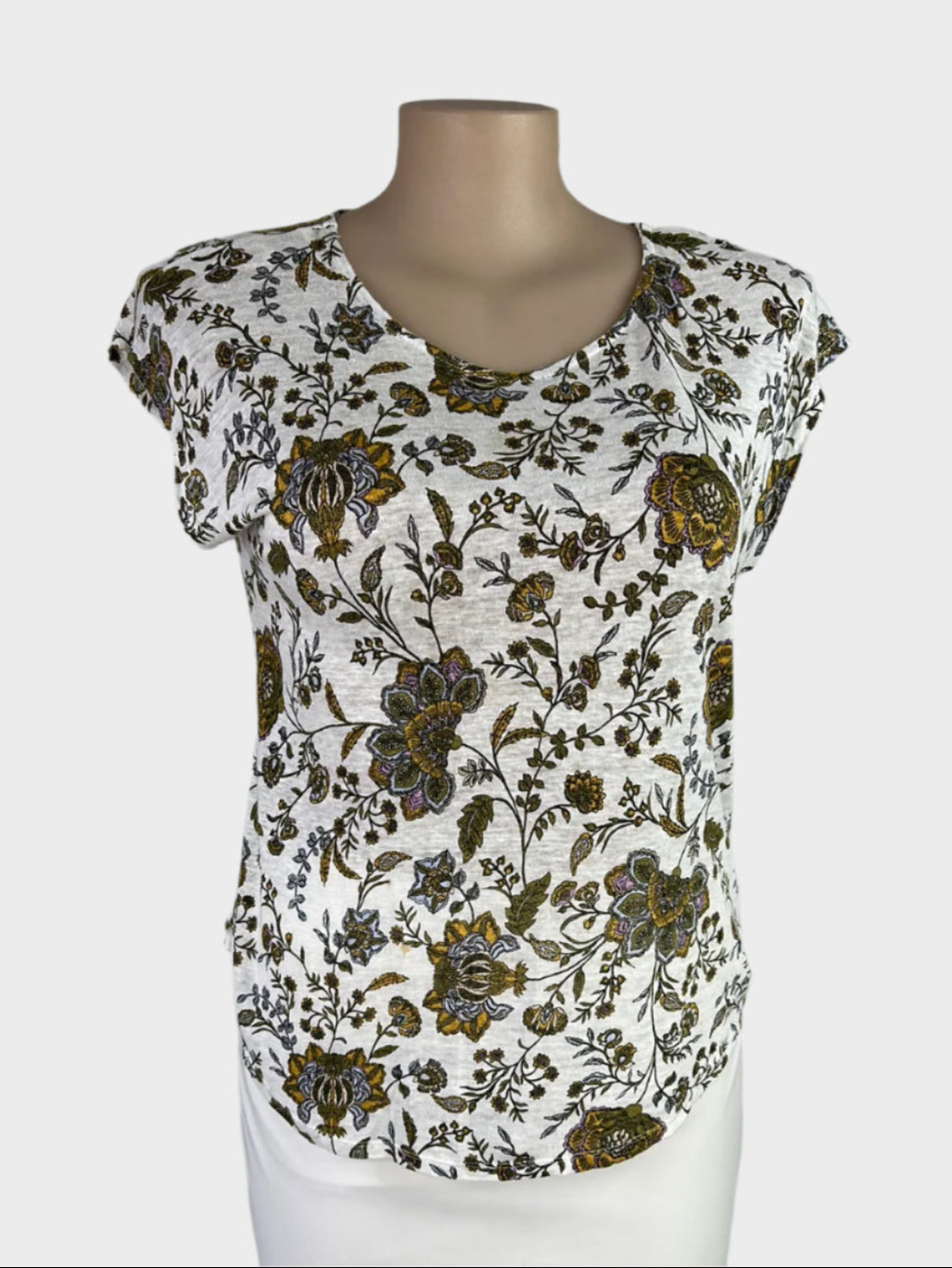 Designer Rachel Ashwell cream and olive boho style top in linen jersey with floral print, scoop neck, and shirt tail hem for smart casual wear.