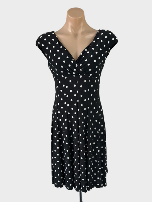 Designer Ralph Lauren black and white retro 80's empire waist dress in polka dot jersey with surplice neck and full skirt for office or smart casual wear.