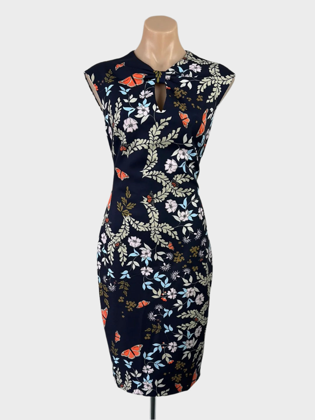 Designer Ted Baker blue sheath dress with floral print, keyhole neck, and pencil skirt for special events or office wear.