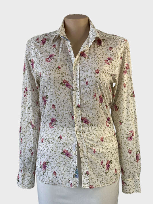 Designer Ted Baker white and pink floral shirt in cotton with button-up closure, standard collar, and curved hem for office wear or smart casual.