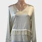 Designer Transit Par Such satin top in cream with crepe trim and tiered hem for evening or special events.