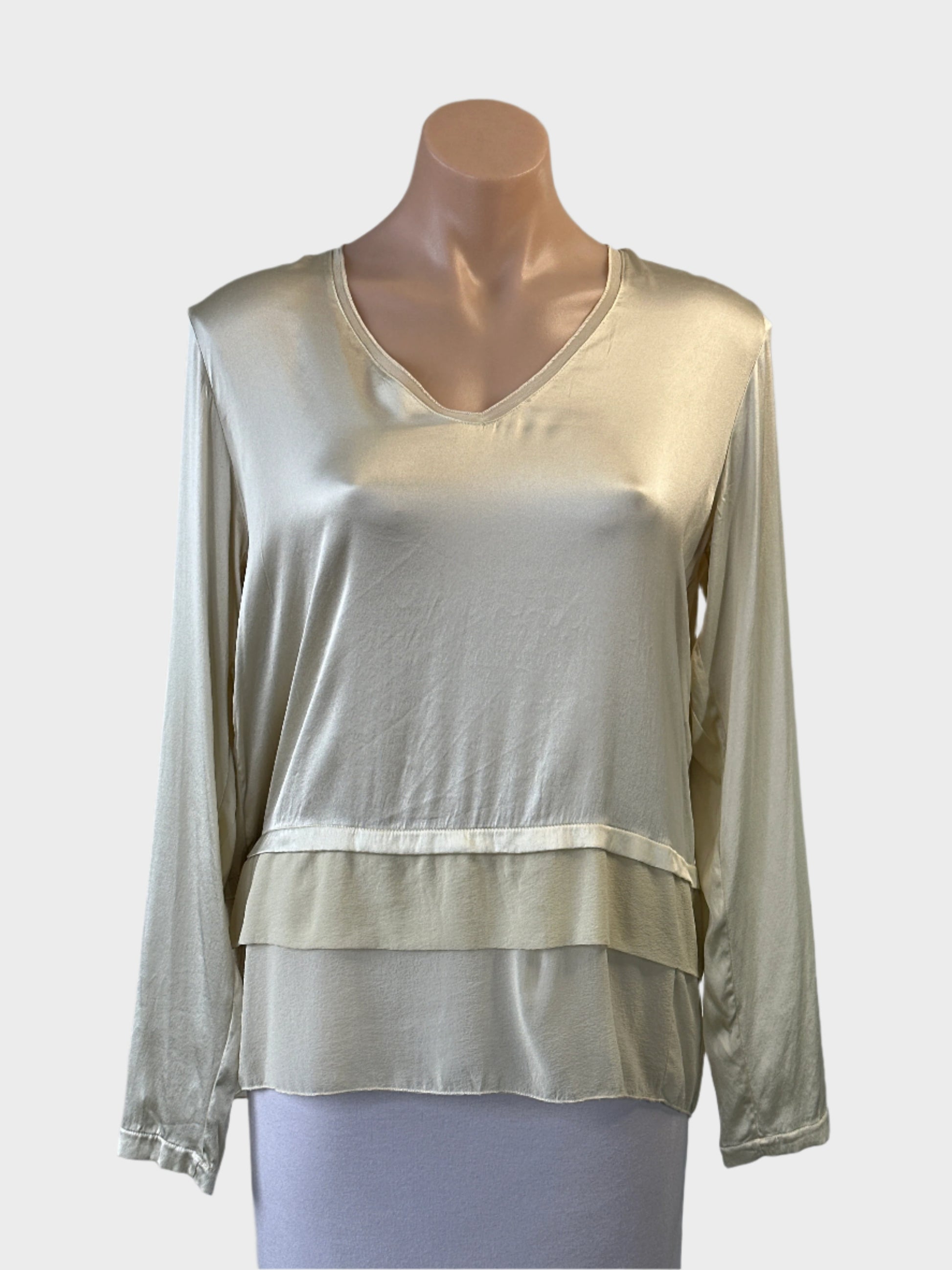 Designer Transit Par Such satin top in cream with crepe trim and tiered hem for evening or special events.