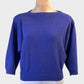 Designer United Colors of Benetton sweater in purple cashmere blend with open back for evening or smart casual wear.