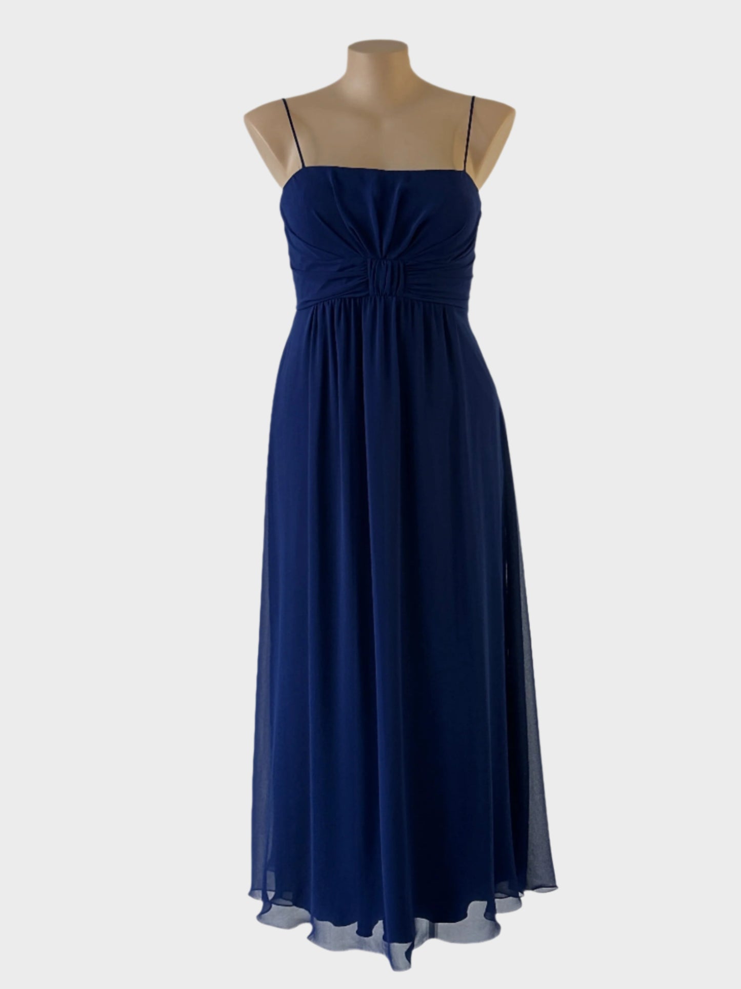 Diana Ferrari sleeveless gown in blue crepe with spaghetti straps, bow detail and gathered skirt for formal wear.