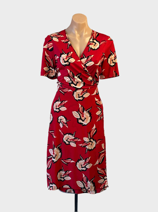 Designer Diane von Furstenberg red and black floral silk wrap dress with jersey top and tulip skirt for office or special events.