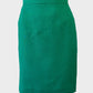 Designer Didier Parakian straight skirt in green slub weave with regular waistband and back vent for office wear.