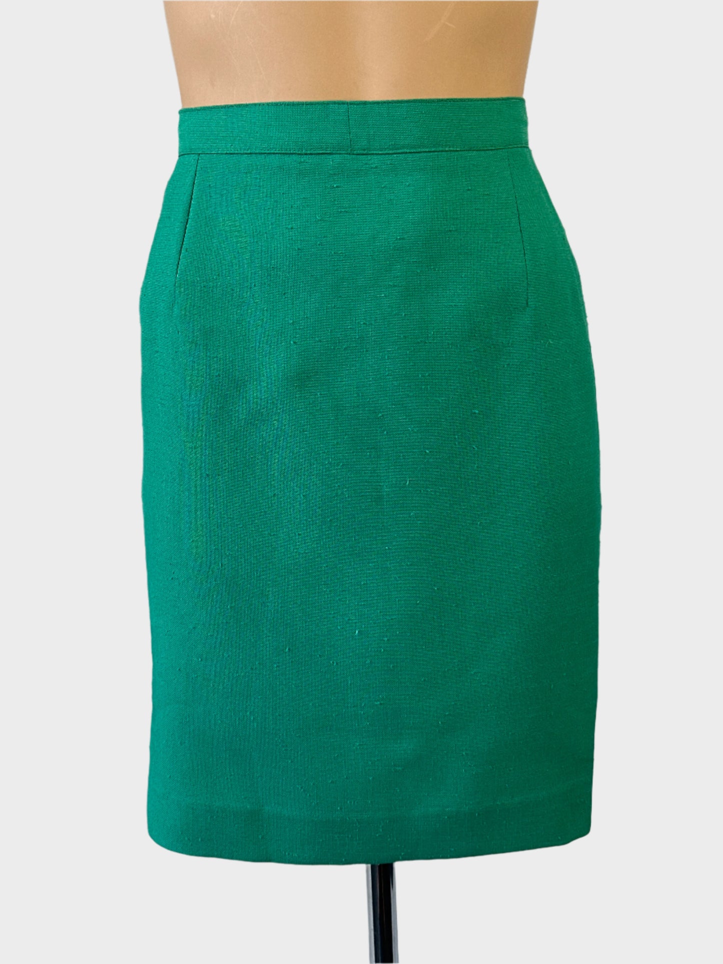 Designer Didier Parakian straight skirt in green slub weave with regular waistband and back vent for office wear.