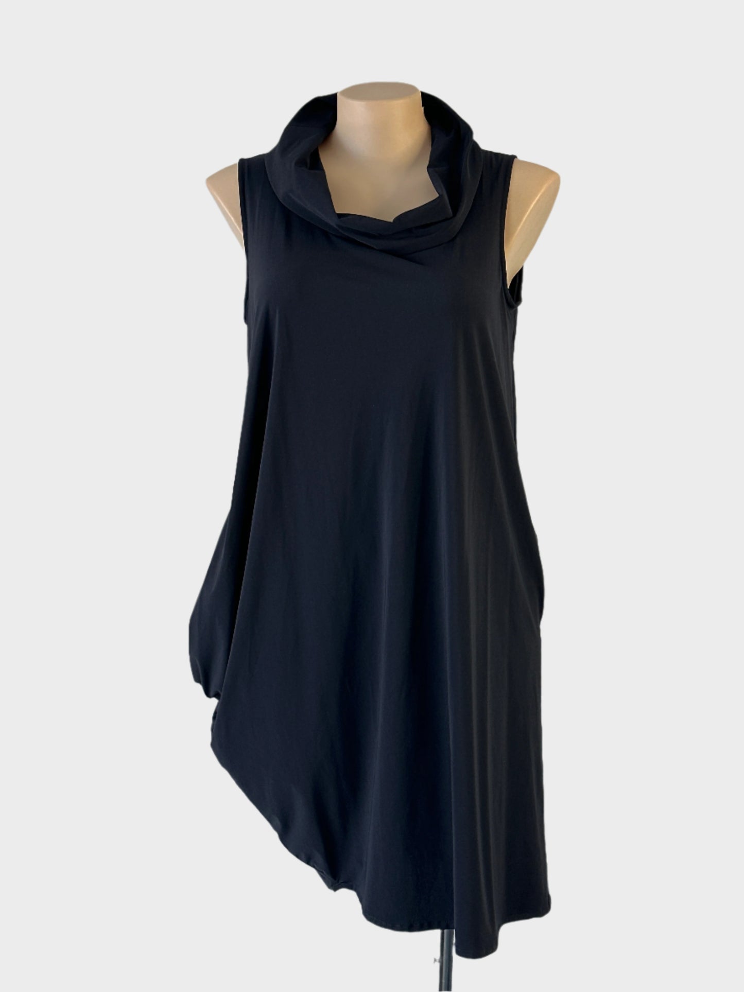 Designer DIGBYS cocoon dress in black jersey with draped front, cowl neck and asymmetric skirt for smart casual or office wear.