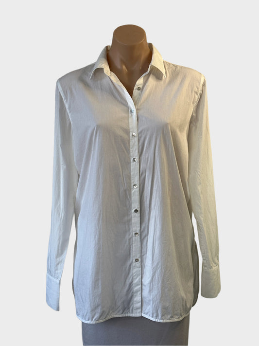 Elka Collective classic white shirt with pleated back yoke and shirt tail hem for office or smart casual wear.