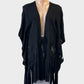 Designer Escada cape style vest in ribbed knit, featuring open front with self-tie fastening and long fringe hem.