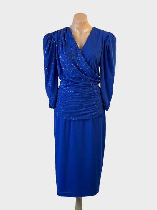 Fantasia sheath dress in cobalt blue with sequin detailing and asymmetric ruched bodice for formal wear.