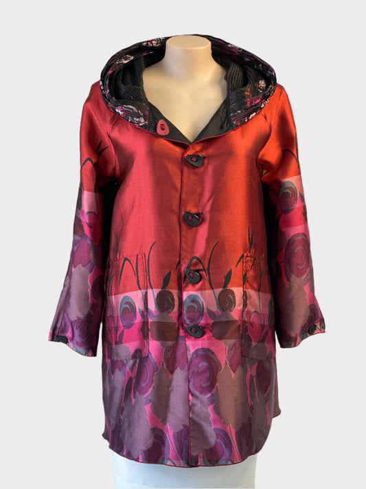 Fella Hamilton black and orange floral satin reversible coat with pleated hood for evening or special events wear.