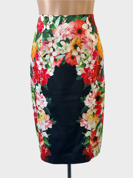 Designer FOIL straight skirt in multicoloured floral print with contour waist and back vent for office or events.