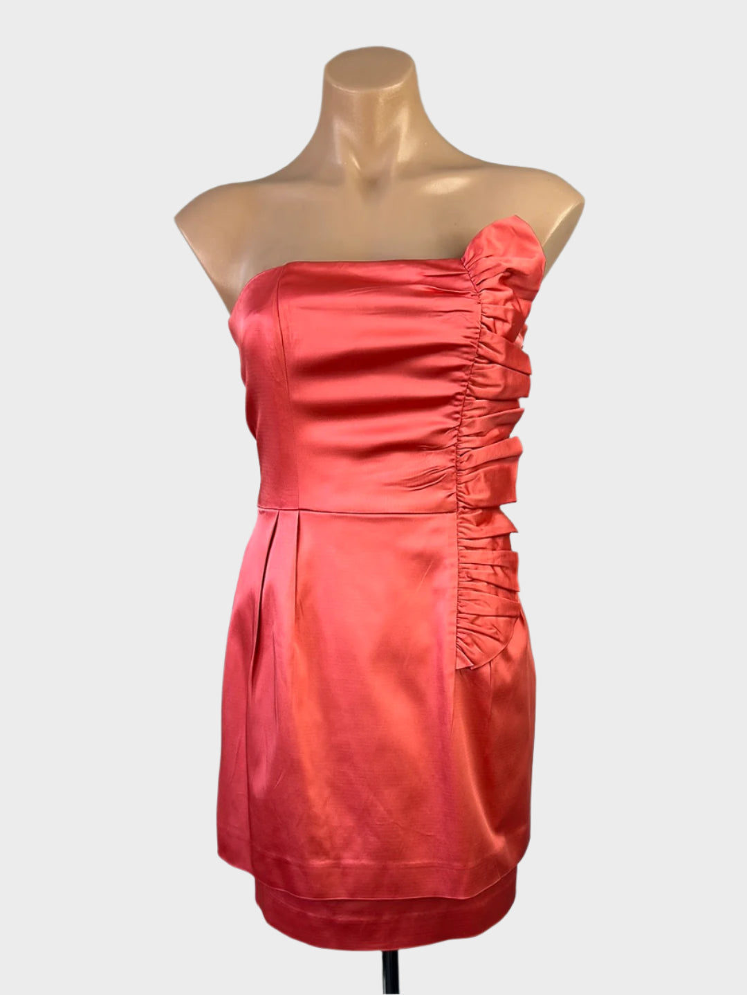 Designer Forever New orange strapless dress with satin finish, ruffle trim, and pleated pencil skirt for formal wear.