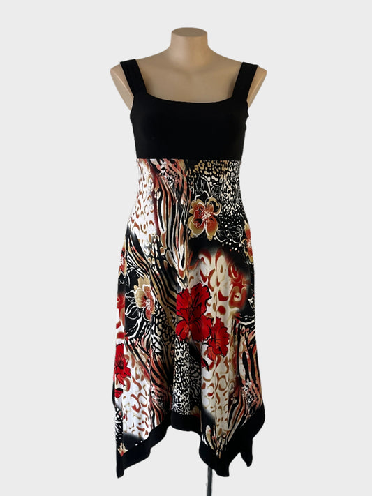 Designer Frank Lyman empire waist dress in multicoloured jersey with floral print, contrasting bodice, square neck and handkerchief skirt for evening or smart casual wear.