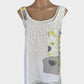 Gordon Smith white sleeveless tank top in sheer crepe with embroidery, beading, and notched hem for office or smart casual.