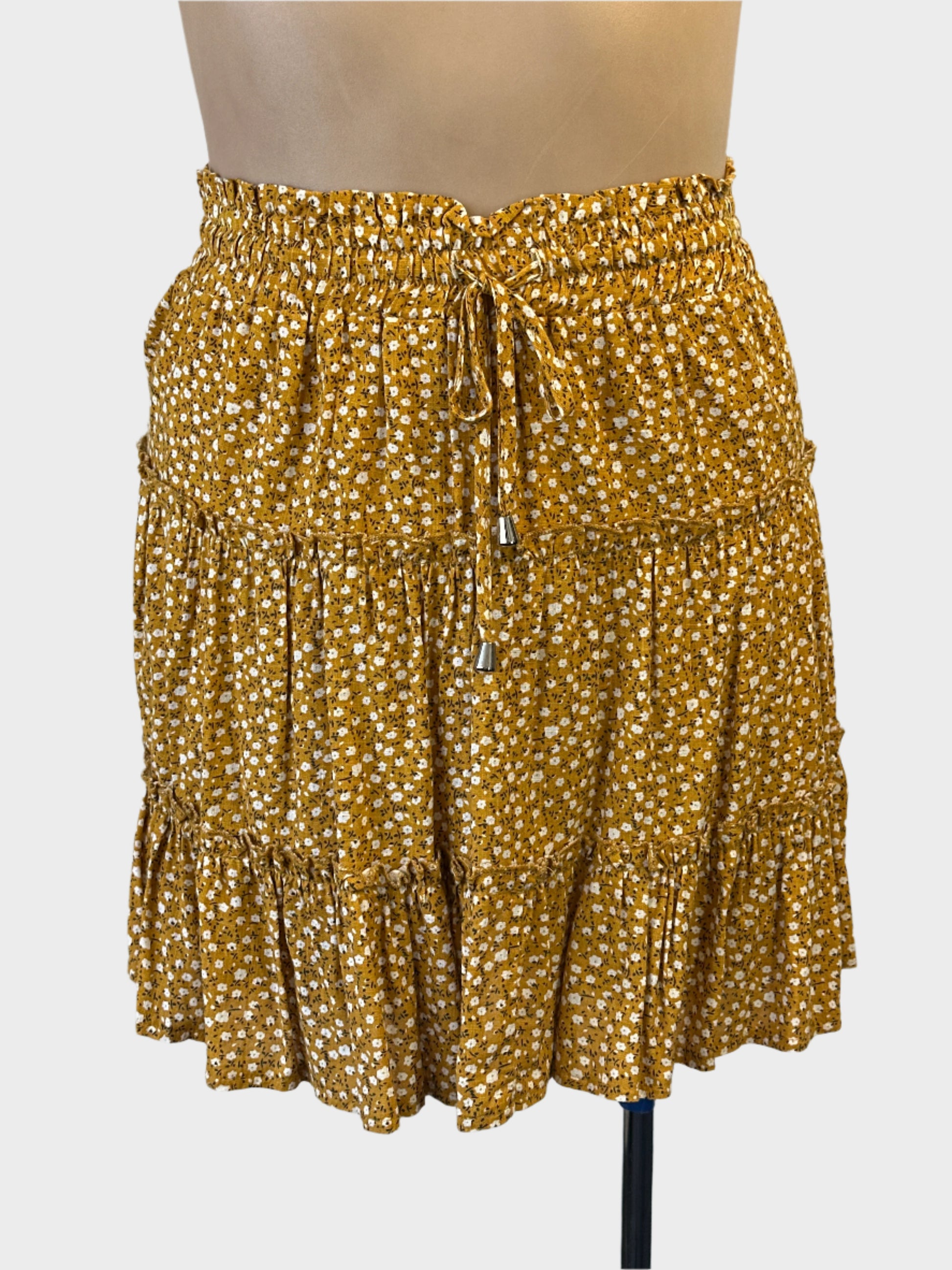 Grace & Co. tiered skirt in yellow and white ditsy floral print for resort or smart casual wear.