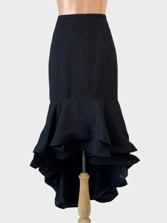 Designer Gracia flamenco-style black tiered maxi skirt with curved yoke and layered flounce hem for formal or evening wear.