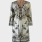 Designer Hale Bob shift dress in neutral jersey with exotic Eastern style peacock print, diamante collar and straight skirt for office or smart casual wear.