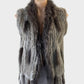 Heavenly open front vest in grey rabbit fur with appliqué and fringe hem for office or smart casual wear.